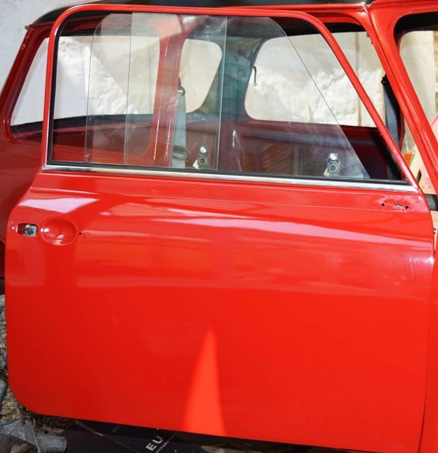 why did the classic Mini have sliding windows